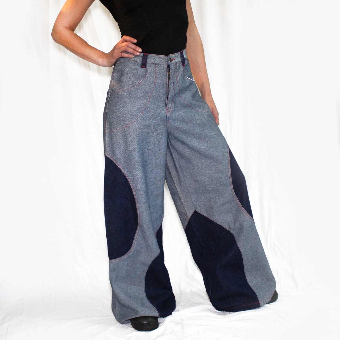 Light denim circle phat pants by ministry of style front view