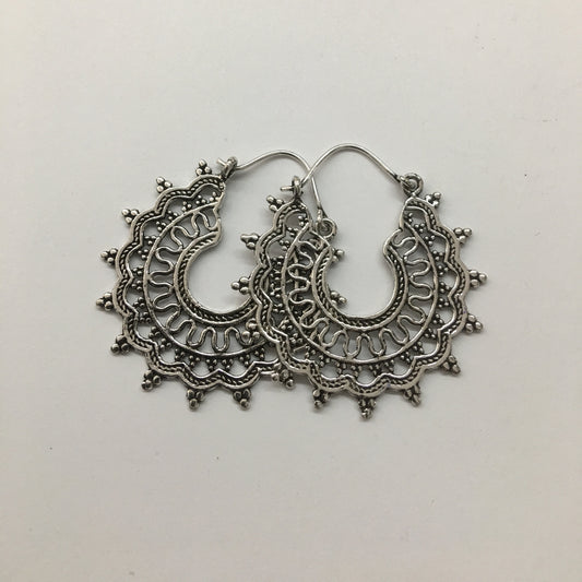 Silver ornate hoop earring